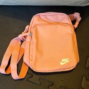 Nike Coral/peach color over the should/crossbody adjustable zip closure bag